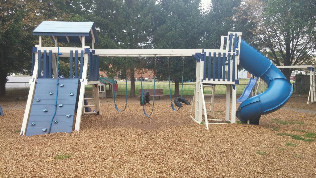 Kids and parents love our fenced outdoor Playgrounds!